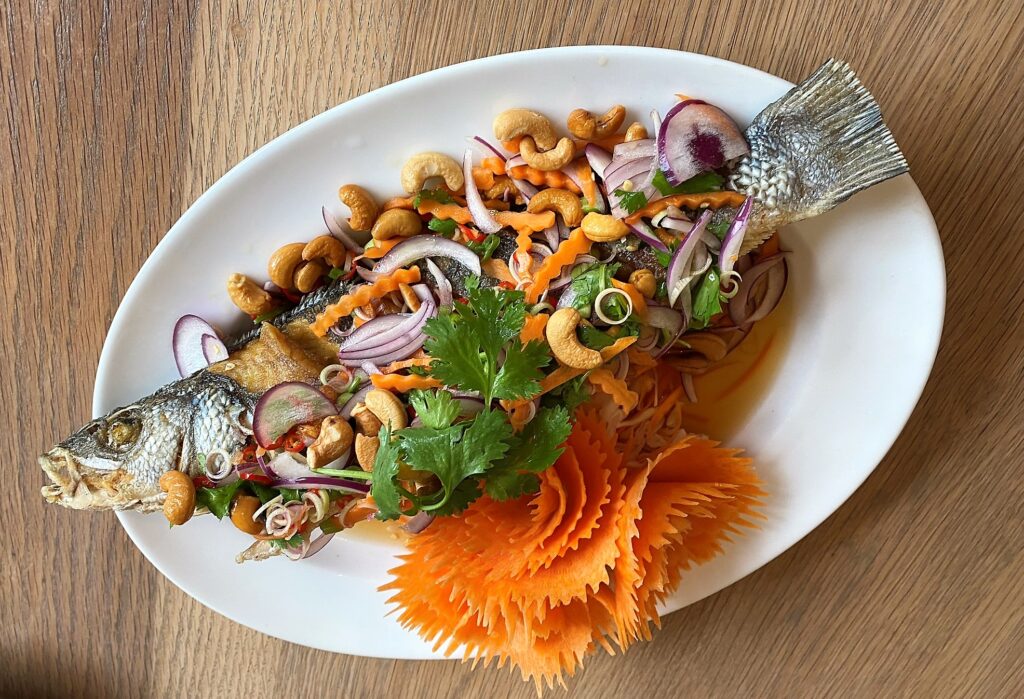 Authentic Thai food, crispy sea bass with Thai herbs at the Queens Head Harston Cambridgeshire